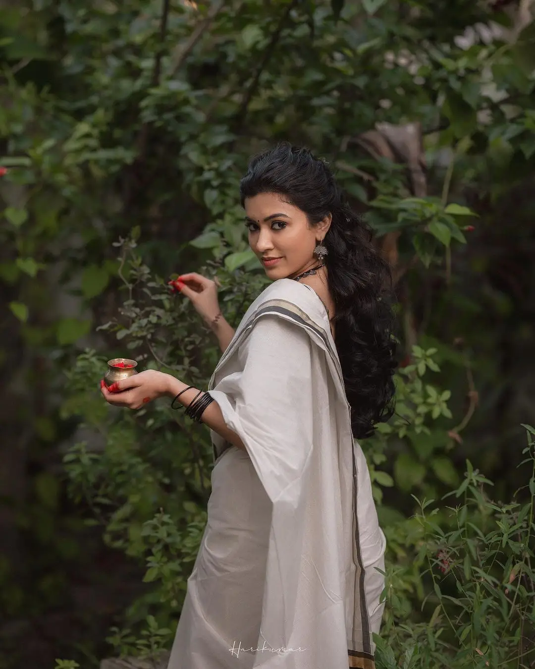 Malayalam Actress Anju Kurian Stills in White Saree Black Blouse